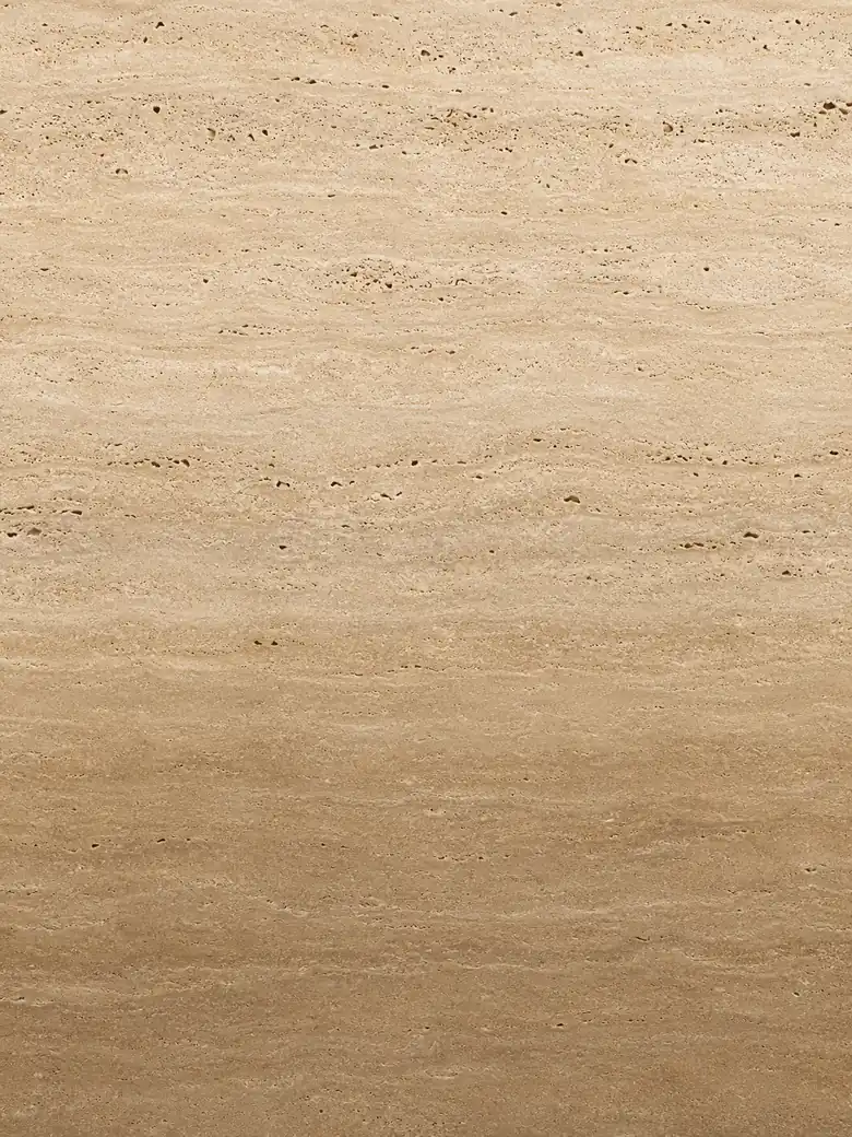 Warm beige travertine surface with natural pores and linear movement